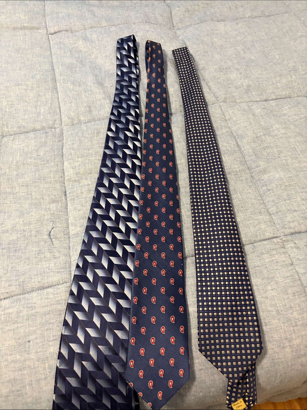 Club Room Navy Ties Set with Red Paisley and Geometric Patterns.